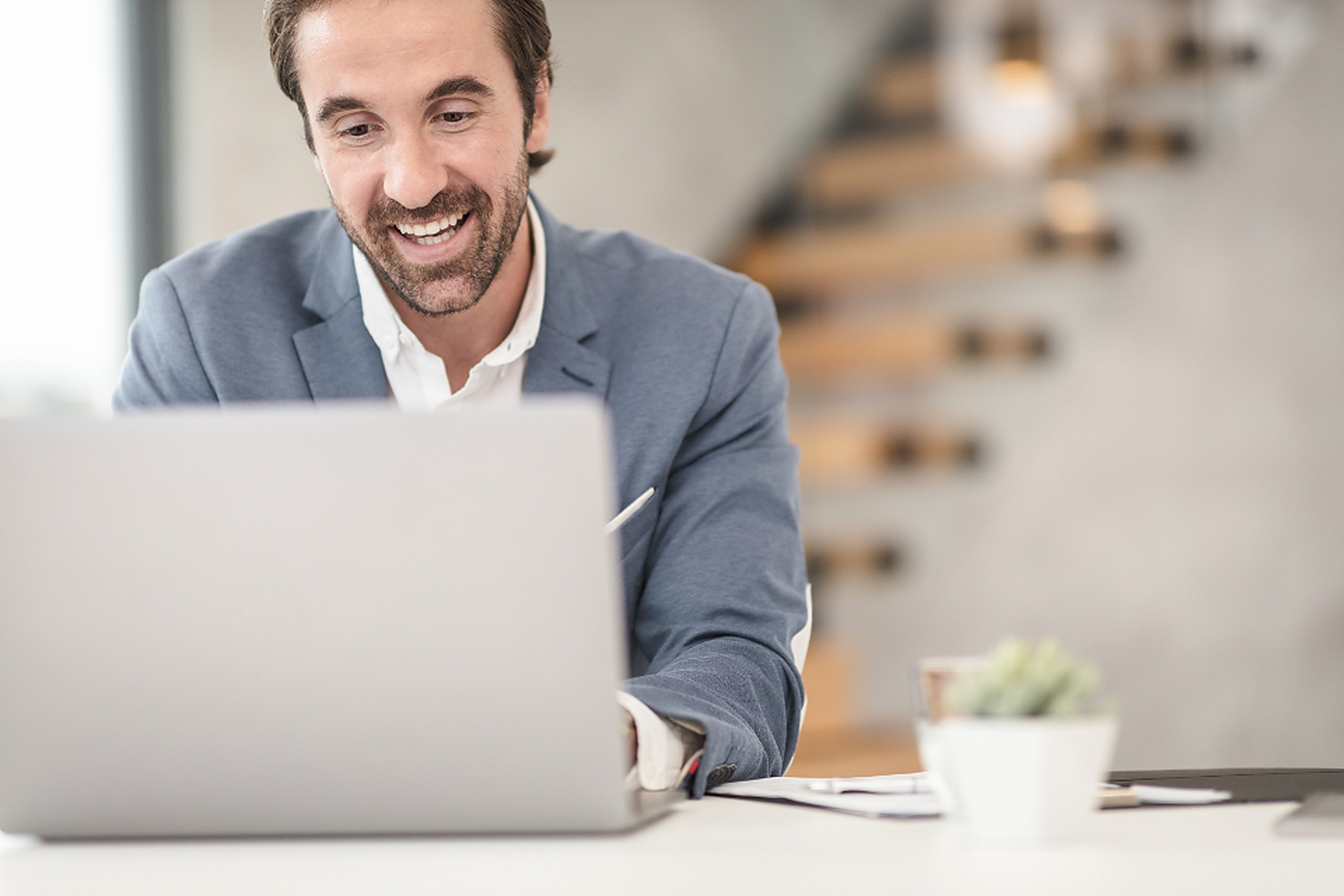 Person joining a video meeting on a laptop
