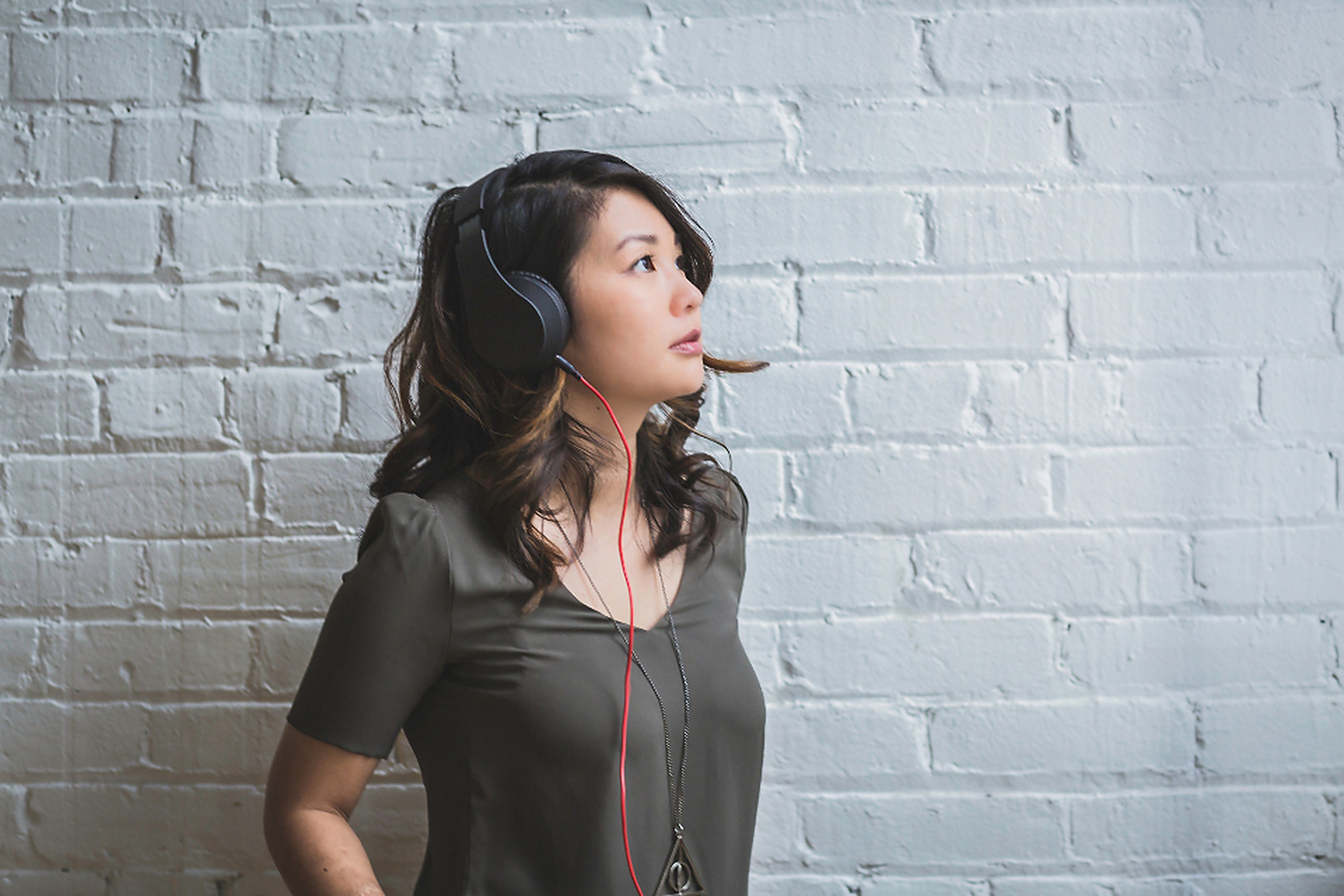 Person listening carefully with headphones